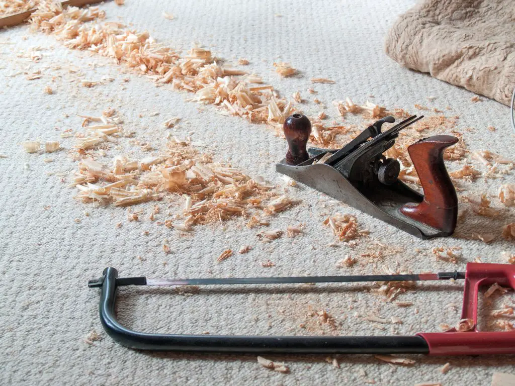 Classic Saw And Jack Plane Made Chips On Bright Carpet